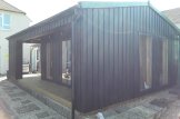 Kleines Holzhaus ANNA Modern (34 mm + Holzverschalung), 20 m² + 16 m² Terrasse customer 3