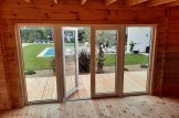 Gartenhaus aus Holz PREMIUM (Extra Isoliert, 34 mm + Holzverschalung), 7x4 m, 28 m² customer 3